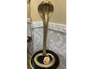 Statua serpente dorato